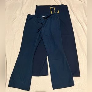 Two navy blue scrub pants. Size small.